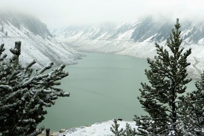 Scenic view of snow covered mountains