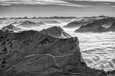 Scenic view of snowcapped mountains against sky