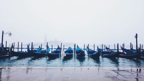 Gondolas moored on grand canal