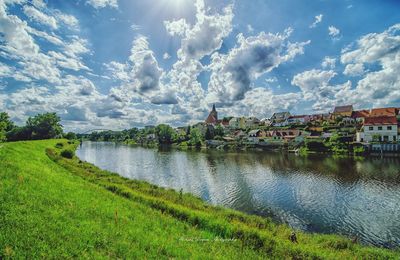 View of river against cloudy sky