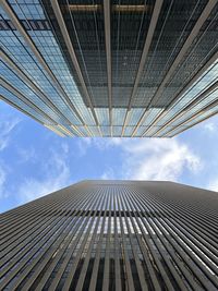 Low angle view of modern buildings against sky
