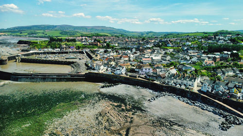 High angle view of river amidst buildings in town