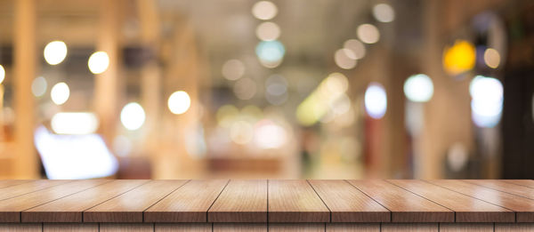 Defocused image of wooden table