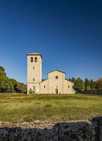 Historic building against clear blue sky