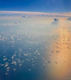 Scenic view of sea against sky at sunset