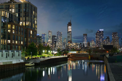 Illuminated buildings in city at night