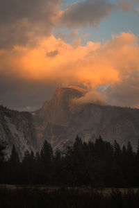 Scenic view of mountains against sky during sunset