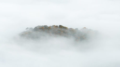 High angle view of foggy weather against sky