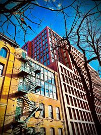 Low angle view of modern building against clear sky