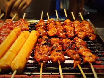 Close-up of meat on barbecue grill