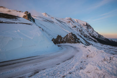 Scenic view of snowcapped mountain against sky