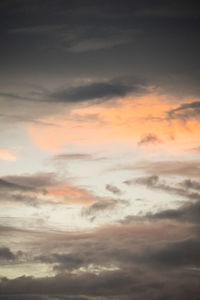 Low angle view of clouds in sky during sunset