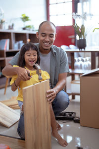 Portrait of boy playing with toy blocks