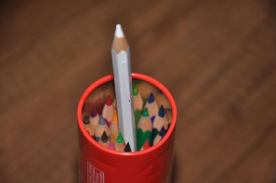 High angle view of colored pencils on table