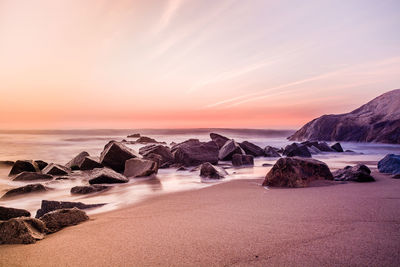 Scenic view of sea at sunset