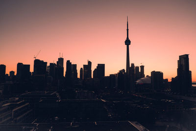 Silhouette of city at sunset