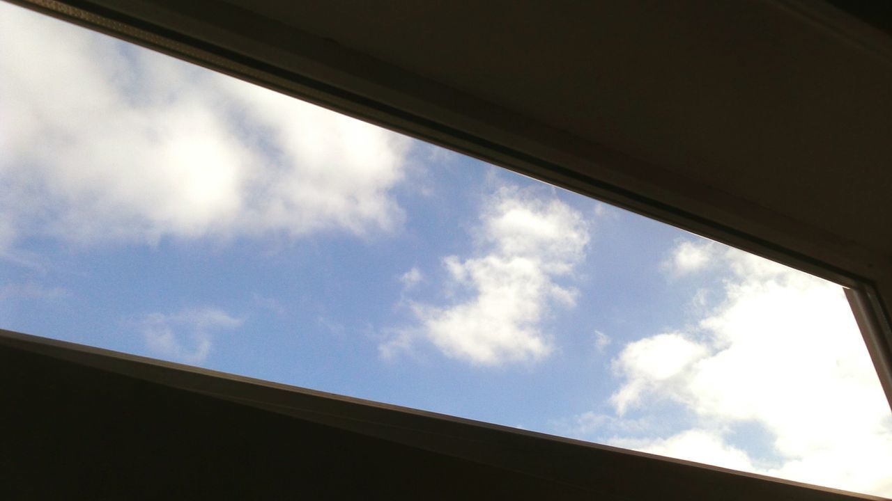 LOW ANGLE VIEW OF SKY SEEN FROM WINDOW