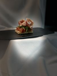 High angle view of rose in plate on table