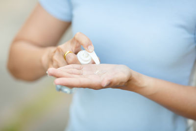 Close-up of woman holding hands