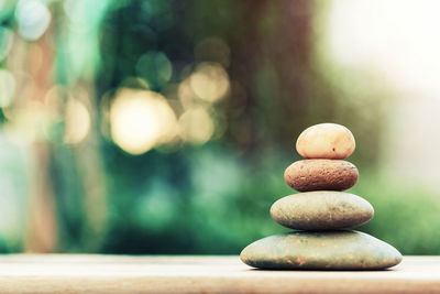 Stack of stones on table