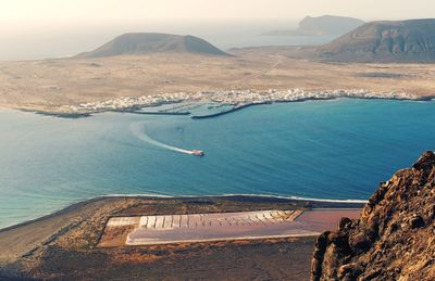 Coastal scenery, view from mirador de nahum on island la graciosa, caleta del sebo at lanzerote