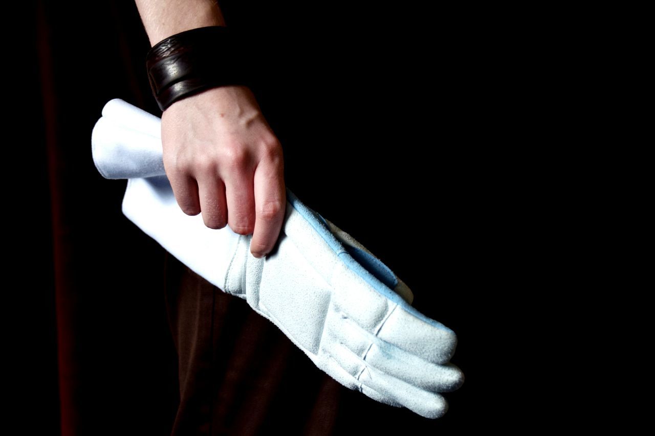 CROPPED IMAGE OF WOMAN HAND OVER WHITE BACKGROUND