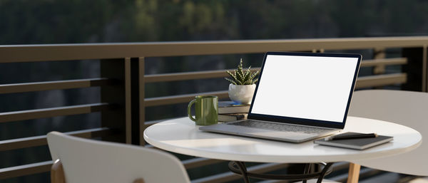 Close-up of laptop on table