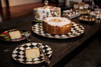 Close-up of cake served on table