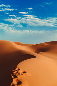 Scenic view of desert against sky