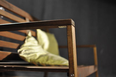 Close-up of an empty chair against blurred background