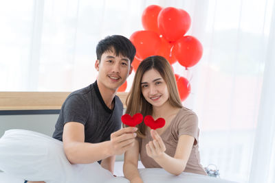 Portrait of a smiling young couple