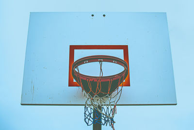 Patriotic colors on the net of this old school basketball hoop