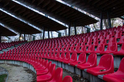 Empty chairs in row at stadium