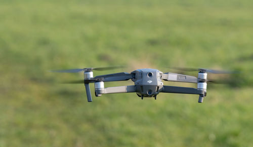 Airplane flying against blurred background