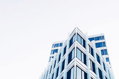 Low angle view of buildings against clear sky