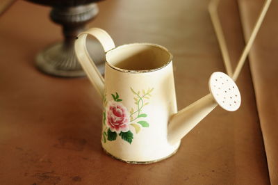 Close-up of coffee cup on table