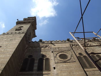 Low angle view of historic building against sky