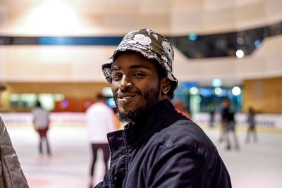 Portrait of smiling young man outdoors