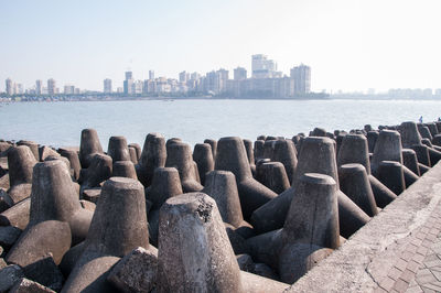 Panoramic view of sea and buildings against sky