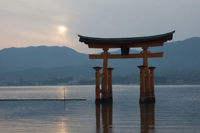 View of temple against cloudy sky