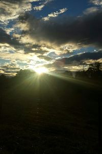 Scenic view of landscape at sunset