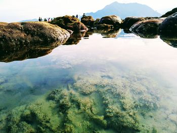 Scenic view of rocks against sky