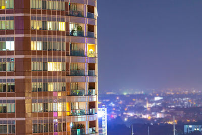 Modern buildings in city at night