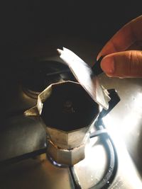 High angle view of person hand on table