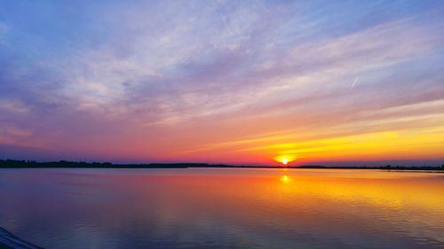 Scenic view of sunset over river