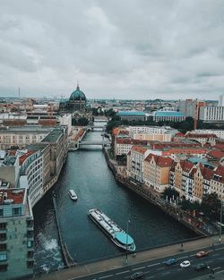 High angle view of boats sailing spree river in city