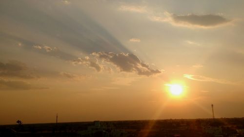 Sun shining through clouds