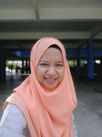 Portrait of smiling young woman