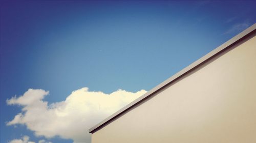 Low angle view of built structure against blue sky