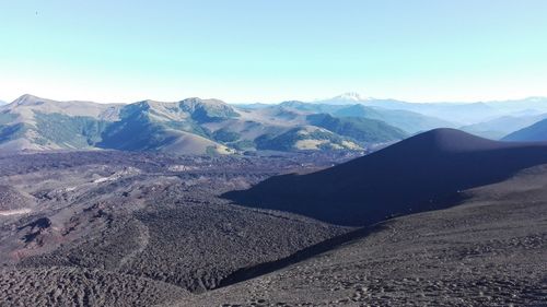 Scenic view of mountains against clear sky